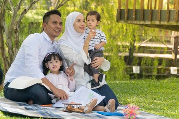 Malay family at recreational park having fun