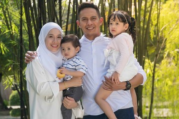 Malay family at recreational park having fun