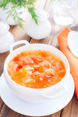 vegetable soup with onions and cabbage for onion diet in a white bowl, selective focus