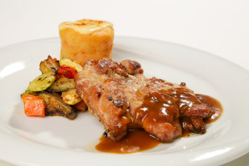 barbeque sauced marinated grilled chicken with side dish isolated white