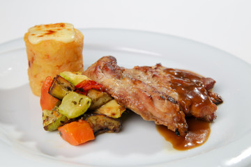 barbeque sauced marinated grilled chicken with side dish isolated white