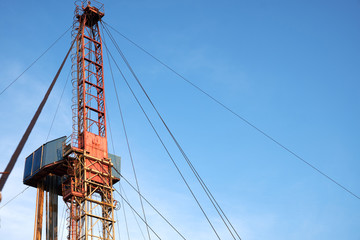 part of the rig in action with pipes in the evening