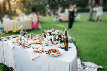 wedding table for guests in the forest