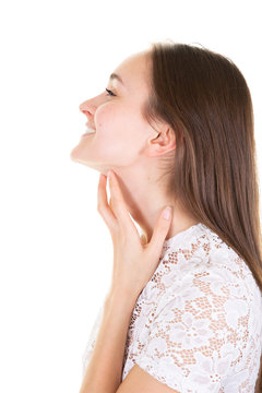 Beautiful young woman touching skin neck profile view