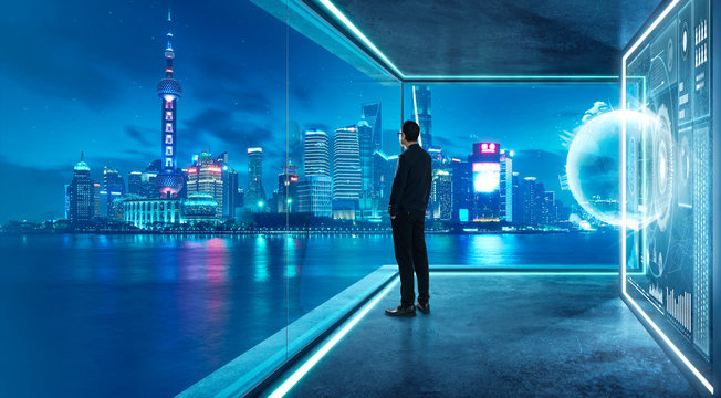 Businessman in suit. with virtual 3d holographic interface screens . Futuristic business, technology, internet and social networking technology concept .