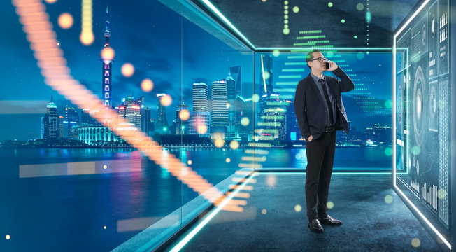 Businessman in suit working with virtual 3d holographic interface screens . Futuristic business, technology, internet and social networking technology concept .