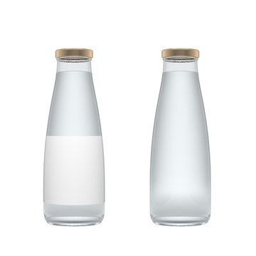 Two transparent glass bottles with label filled by still water isolated over white background.