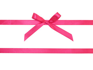 Two pink satin ribbon horizontally with bow on white background