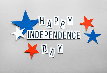 Text HAPPY INDEPENDENCE DAY and stars on grey background