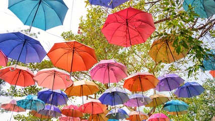 Fototapeta na wymiar colorful umbrellas on the top