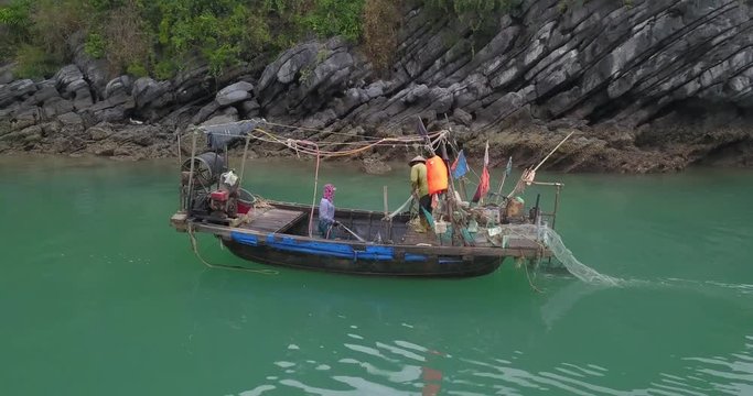 Aerials Footage of Fishing Boats Halong Bay with unidentified Fishermen