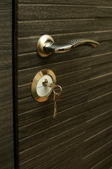 Obraz premium door lock closeup. steel doors. key in the door lock