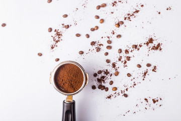 Tool for making professional espresso coffee on a gray table