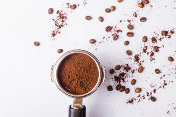 Tool for making professional espresso coffee on a gray table