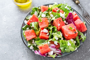 Summer salad with watermelon and salad leaves