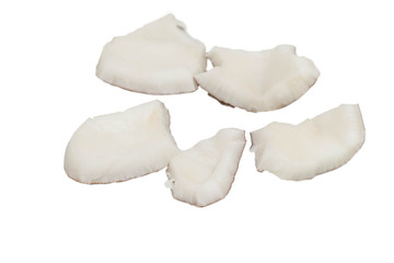 Slices of coconut pulp on a white background - isolate