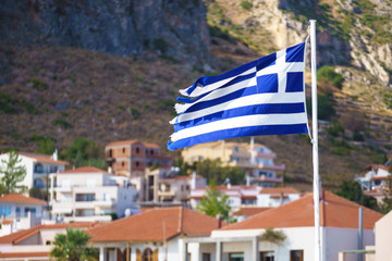 Greek flag against town