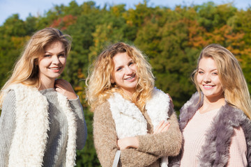 Fototapeta premium Three fashionable models outdoor