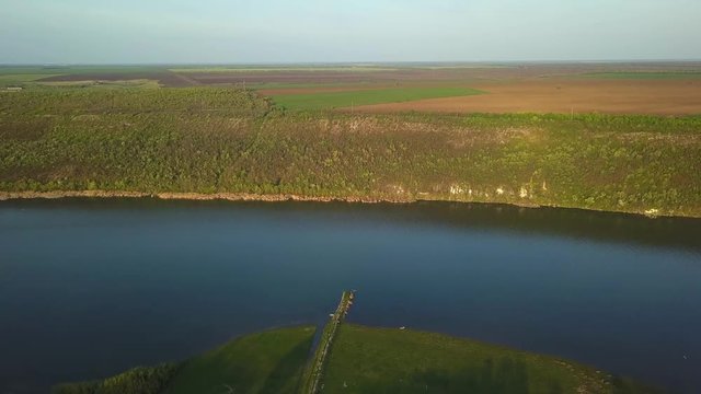 Flight over the river aat spring time. Dniester river of Moldova republic.