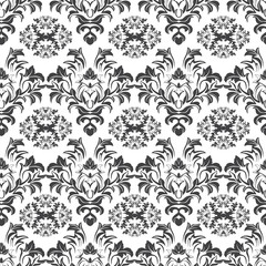 Obraz premium Fashionable dark floral pattern in many kinds of flowers. Seamless vector texture for fashion prints. Print with in hand drawn style on white background.