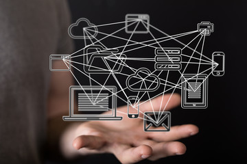 Businessman holding flying network connection
