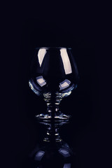 glass for cognac on black background