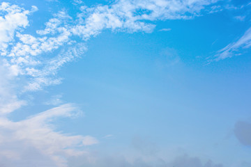 Soft light blue sky background with nature white clouds , copy space