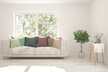 Stylish room in white color with sofa and summer landscape in window. Scandinavian interior design. 3D illustration