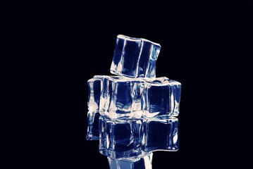 ice cubes on reflection table on black background