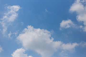 The sky is blue and the clouds are white.