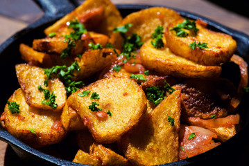 baked fried potatoes with garlic аnd onion