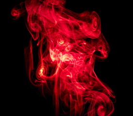 Red smoke on black background