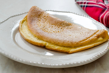 Fluffy Omelette Homemade Mont Saint Michel Style for Breakfast.