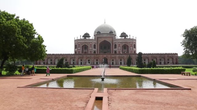 Humayun Tomb, Delhi, India, July 29th 2018: Aerial view of magnificent 16th century mughal architect mausoleum built in red sandstone with the bulbous domes, the slender minarets and delicate ornament