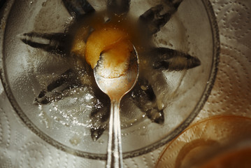 silverspoon left in a saucer with jam