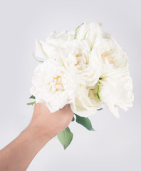 Flower hand white rose isolated over white background