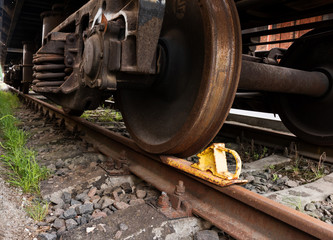 Fototapeta na wymiar A closeup view of the wheels of a train wagon