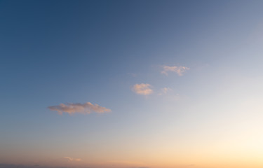 Fototapeta na wymiar Sunset dramatic orange clouds blue sky background