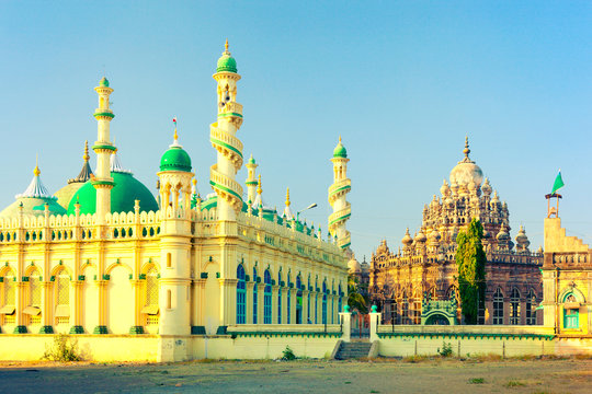 Towering minarets with winding staircases of Jama Masjid and Mahabat Maqbara Palace (Bahauddin Maqbara) - beautiful medieval islamic architecture of Junagadh. Gujarat, India