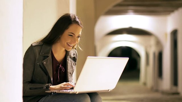 Surprised woman finding online content looks at camera