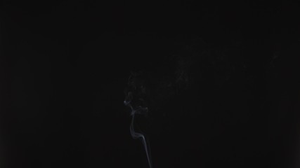 Fototapeta na wymiar Emergence of a thin stream of smoke or steam vape. Cigarette smoke, beautiful and high-quality background animation