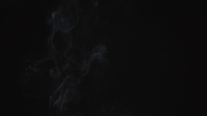 Emergence of a thin stream of smoke or steam vape. Cigarette smoke, beautiful and high-quality background animation
