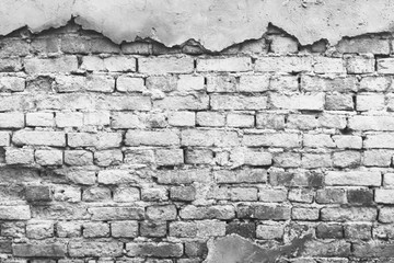 Red cracked brick wall with floor texture background.