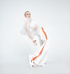 Futuristic lady bending back and looking away