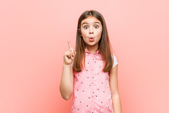 Cute little girl having some great idea, concept of creativity.