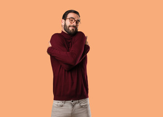Young natural man giving a hug