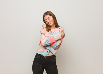 Young russian girl giving a hug