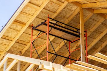 The roof of the house. Tile. Construction of houses. Chimneys.