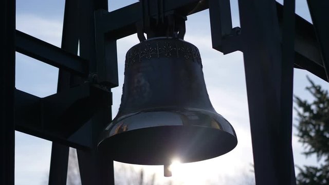 Church bells lens flare in 4k slow motion 60fps