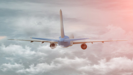 3D rendering of a commercial airplane on flight over the clouds